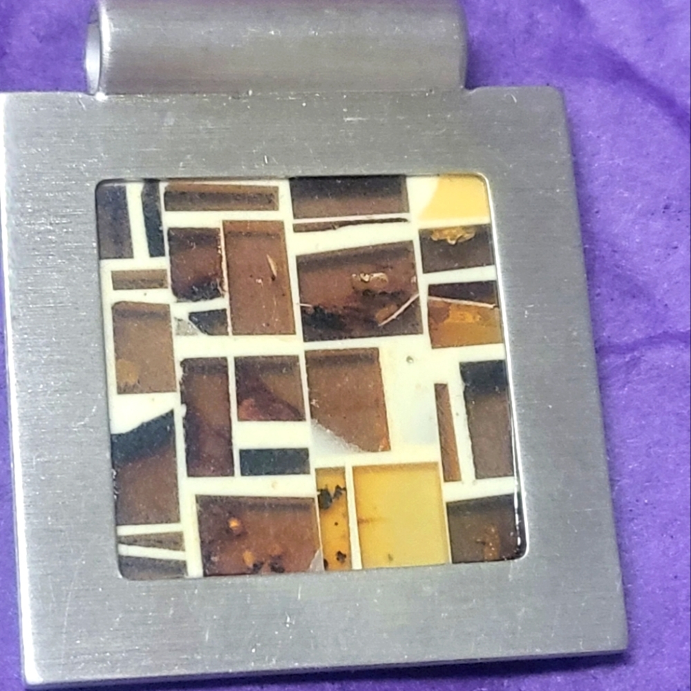Fredrick Duclos Amber Mosaic pendant. Framed in sterling silver.